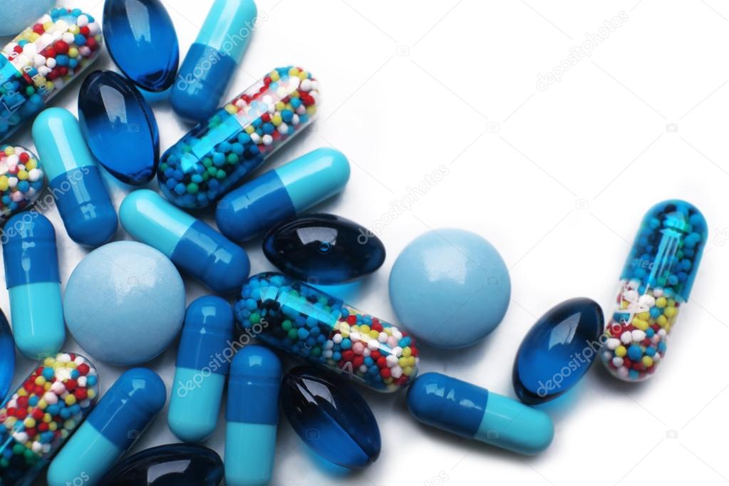 Pile of pills isolated on white