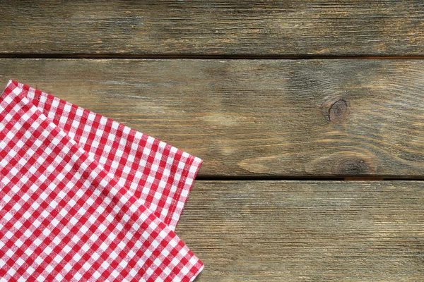 Napkin on wooden table — Stock Photo, Image