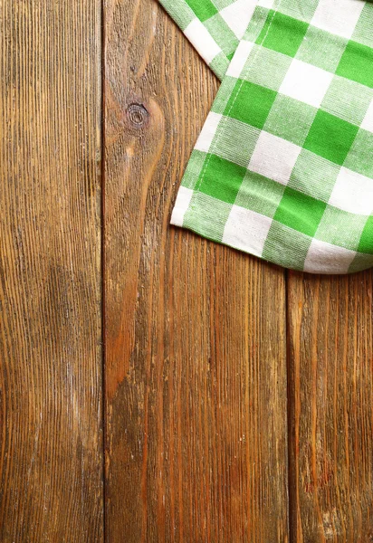 Салфетка на деревянном фоне — стоковое фото