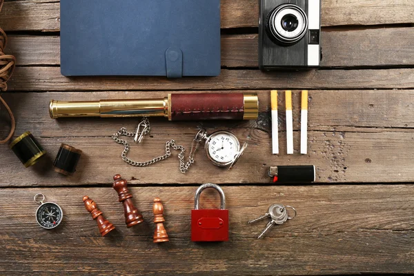 Hiking gear on wooden background — Stock Photo, Image