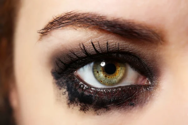 Eye of young woman with tear drop close up — Stock Photo, Image