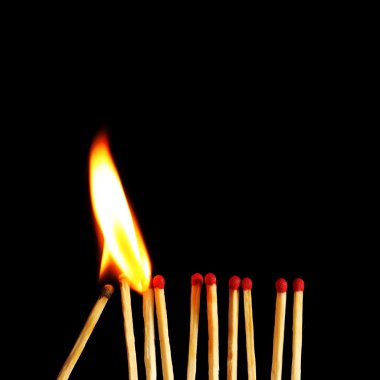 Burning matches close up clipart