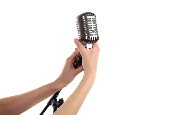 Ρετρό μικρόφωνο στο γυναικείο χέρι — Φωτογραφία Αρχείου
