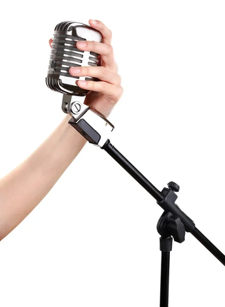 Retro microphone in female hand — Stock Photo, Image