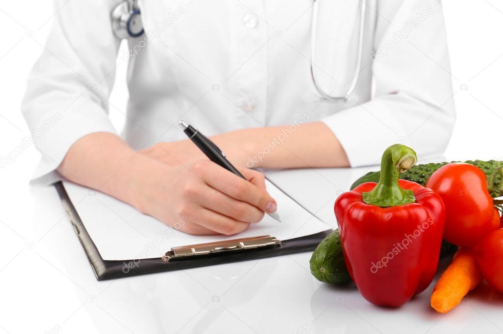 Doctor writing diet plan
