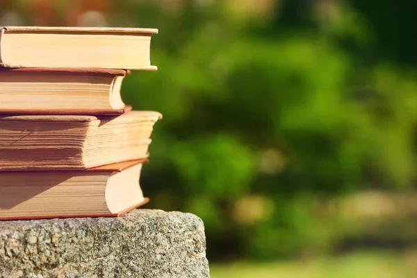 Stack of books outdoors — Stock Photo, Image