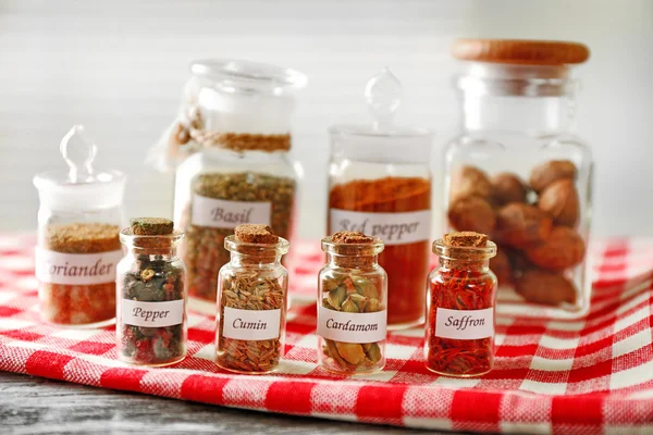 Spices in glass bottles — Stock Photo, Image