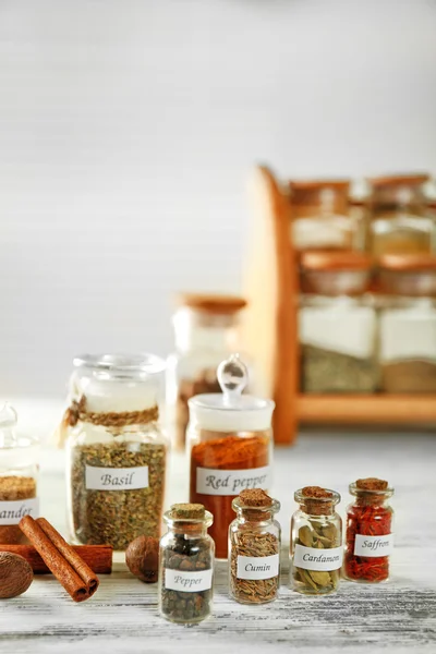 Spices in glass bottles — Stock Photo, Image