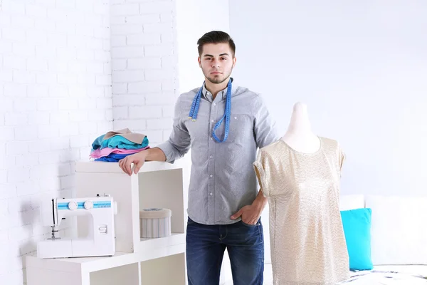 Young man fashion designer in studio — Stock Photo, Image