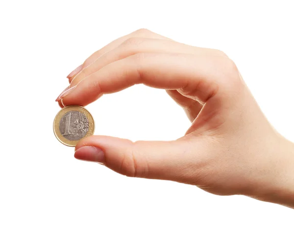 Weibliche Hand mit Münze isoliert auf weiß — Stockfoto