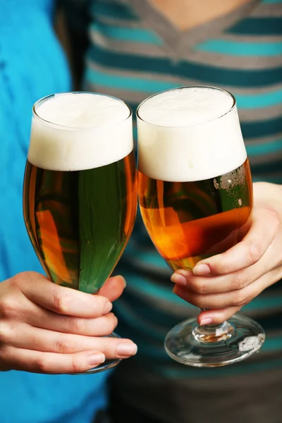 Beer in female hands, closeup — Stock Photo, Image