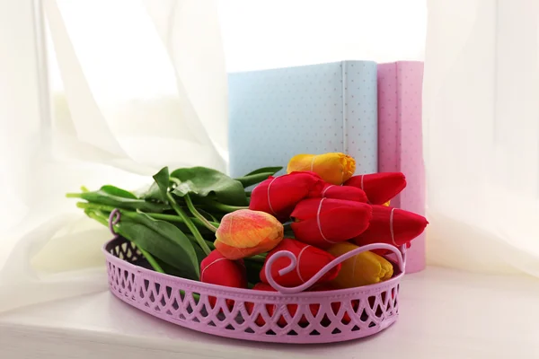 Still life with bouquet of fresh tulips on windowsill background — Stock Photo, Image