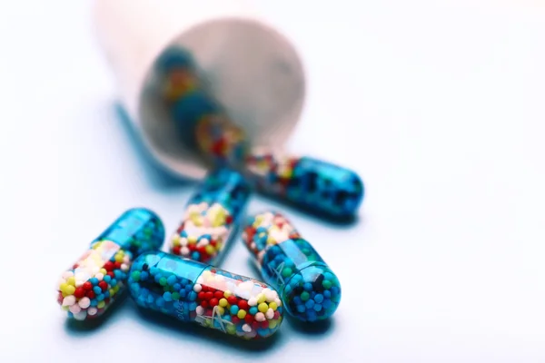 Montón de pastillas en el fondo de color —  Fotos de Stock