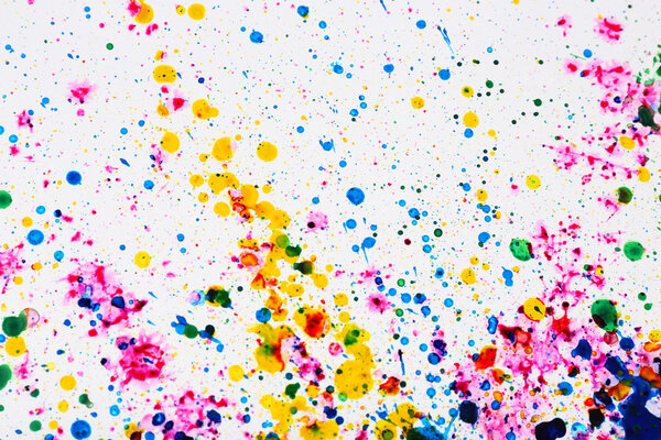 Colorful splashes of paint as background