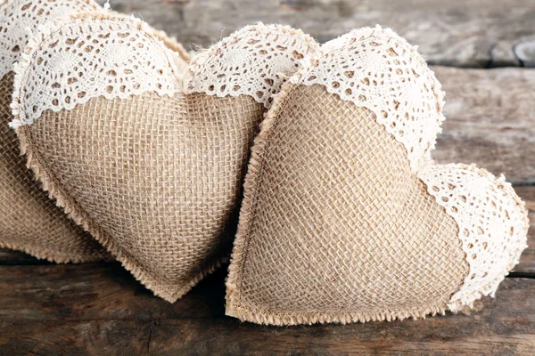 Vintage hearts on wooden background — Stock Photo, Image