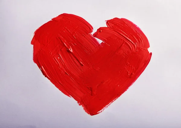 Painted red heart on white paper background — Stock Photo, Image