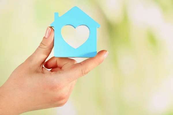 Hand with model of house — Stock Photo, Image