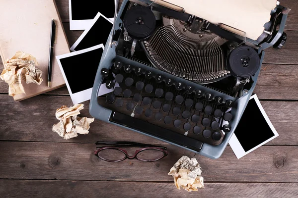 Retro typewriter on wooden table, top view — Stock Photo, Image