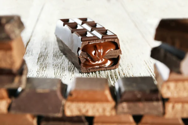 Stuffed chocolate trough frame of chocolate, closeup — Stock Photo, Image