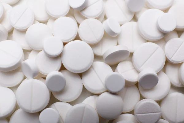 Mucchio di pillole bianche — Foto Stock