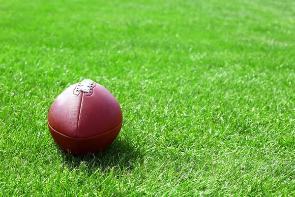 Rugby ball on field — Stock Photo, Image