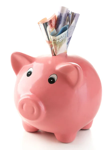 Piggy bank with Canadian dollars — Stock Photo, Image