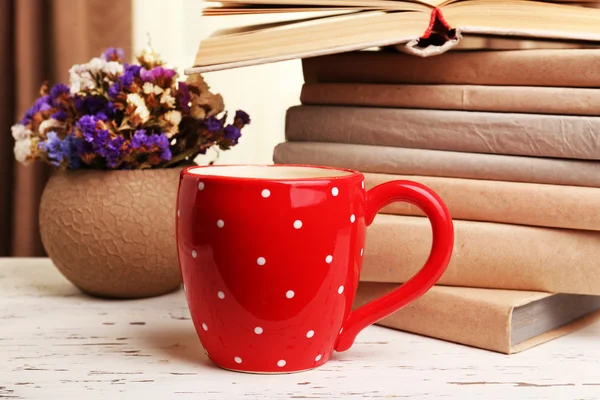 Books, cup and plant — Stock Photo, Image