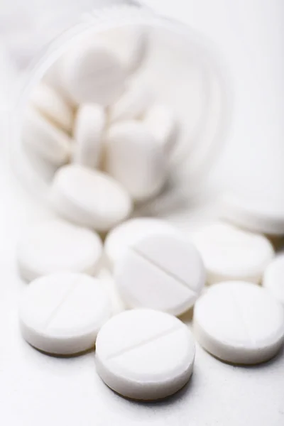 Pile of white pills Royalty Free Stock Images