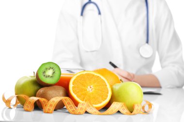 Nutritionist Doctor writing diet plan clipart