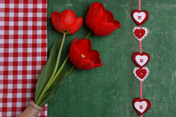 Red tulips in vase — Stock Photo, Image