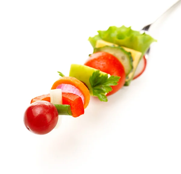 Snack of vegetables on fork — Stock Photo, Image