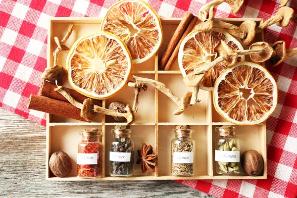 Assortment of spices in glass bottles — Stock Photo, Image