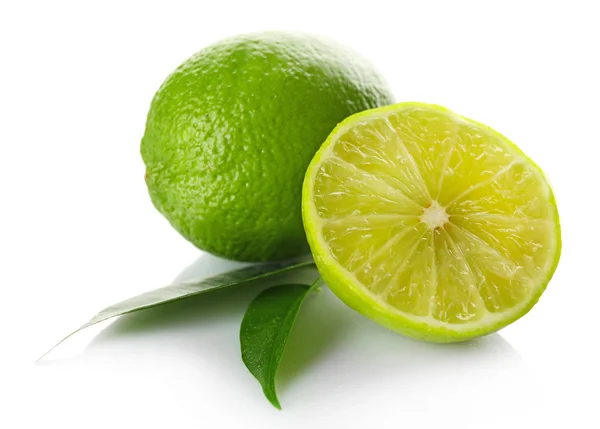 Sliced fresh limes isolated on white — Stock Photo, Image