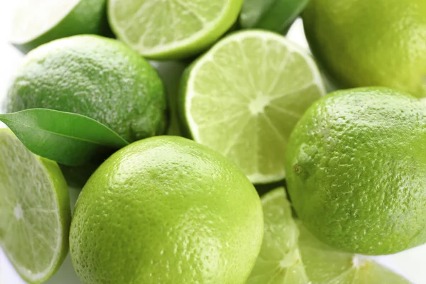 Sliced fresh limes, closeup — Stock Photo, Image