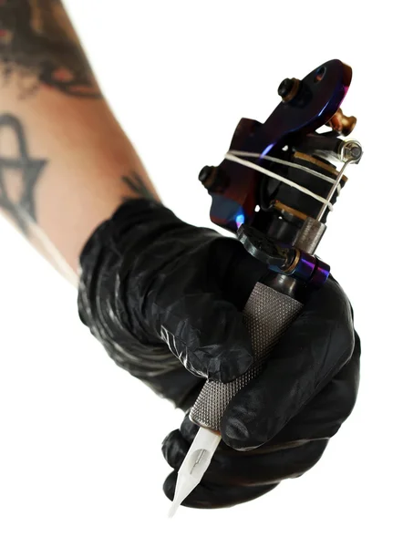 Tatoueur avec machine à tatouer — Photo