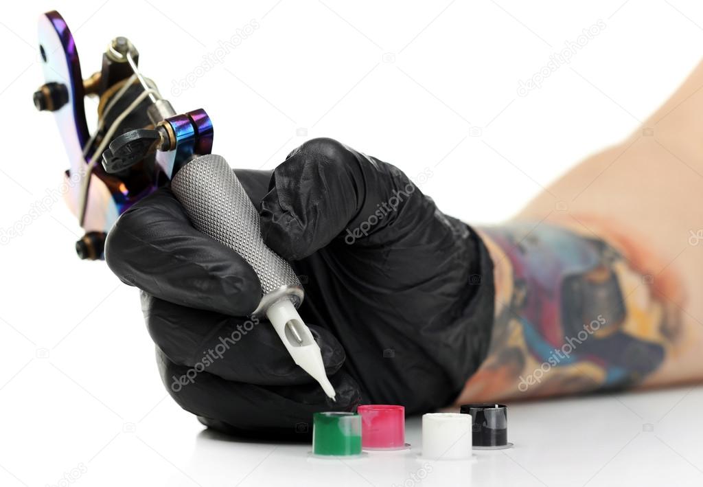 Tattoo artist with tattoo machine