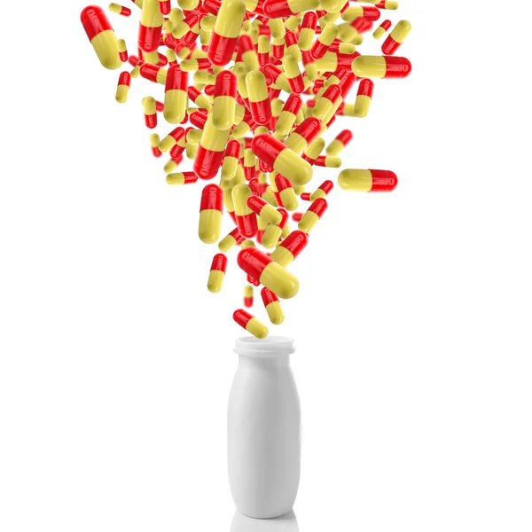 Pillole mediche che cadono in vaso di vetro, isolate su bianco — Foto Stock