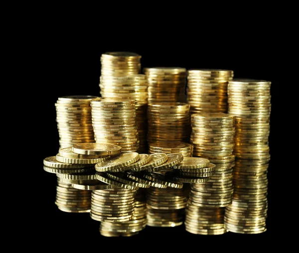 Pile of coins on dark background — Stock Photo, Image