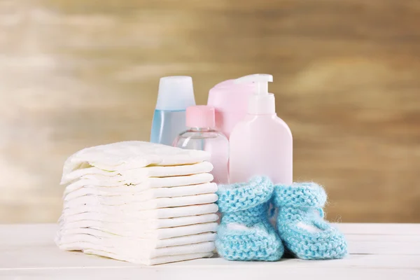 Baby accessories on table on grey background — Stock Photo, Image