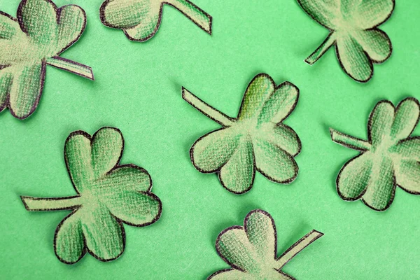 Shamrock leaves on green background — Stock Photo, Image