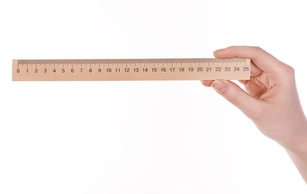 Female hand with wooden ruler — Stock Photo, Image