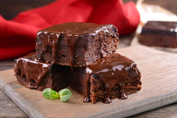 Delicious chocolate cakes on table close-up — Stock Photo, Image