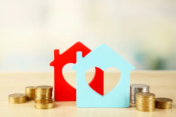 Model of houses with coins — Stock Photo, Image