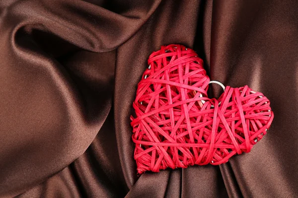 Red heart on fabric background — Stock Photo, Image