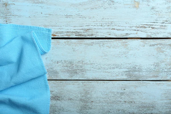 Napkin on wooden table — Stock Photo, Image