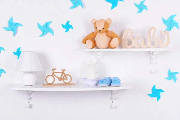 Baby accessories on shelves — Stock Image Baby accessories on shelves Stock Picture