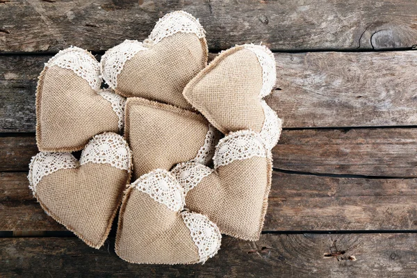 Vintage hearts on wooden background — Stock Photo, Image