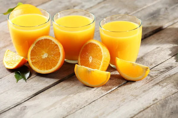 Orange juice on table — Stock Photo, Image