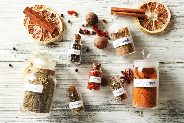 Assortment of spices in glass bottles — Stock Photo, Image