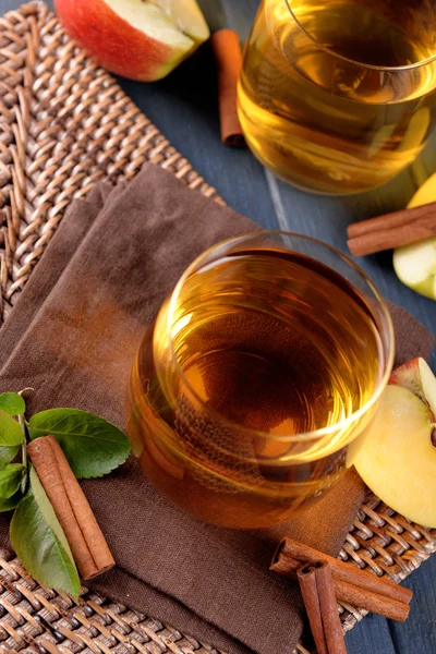 stock image Glasses of apple juice on wooden table